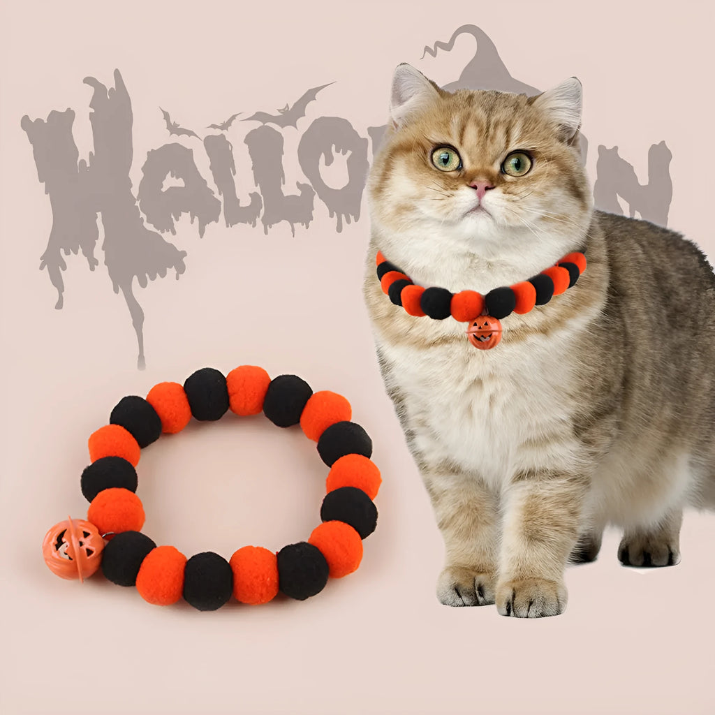 Orange and black Halloween pumpkin design on an adjustable cat collar for trick-or-treat.