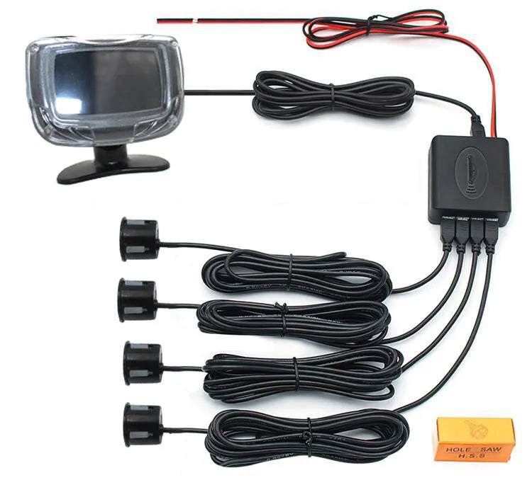 Wireless vehicle reversing sensor kit with main unit, four black probes, LED display, and installation tools.