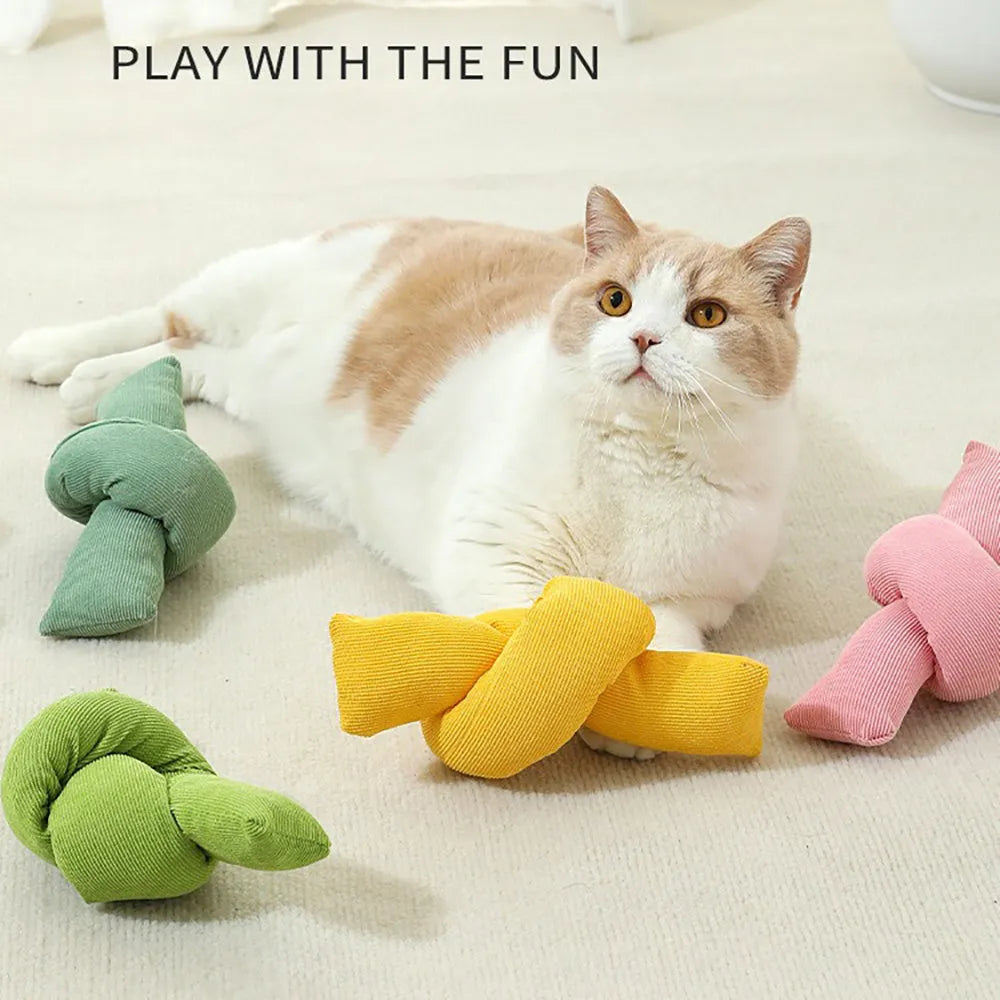 White knotted cotton rope dog toy for chewing and tug-of-war play.