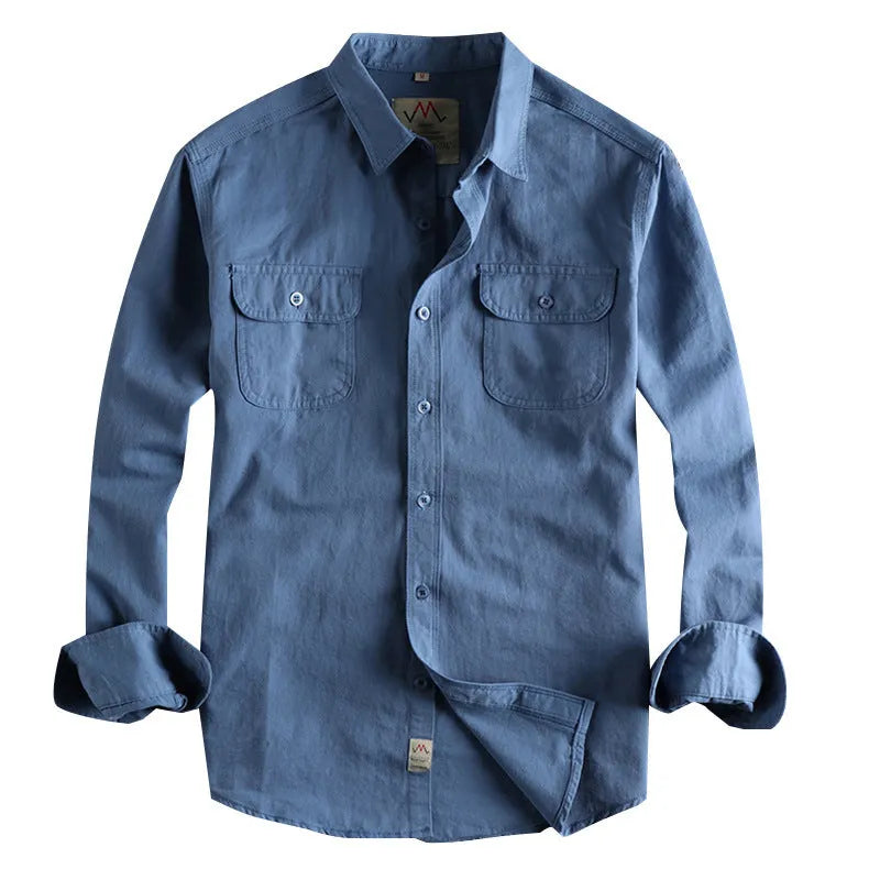 Men's light blue cotton long sleeve shirt in a cardigan style on a hanger.