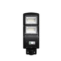 Integrated solar street light with aluminium housing and solar panel, showing remote control and outdoor installation