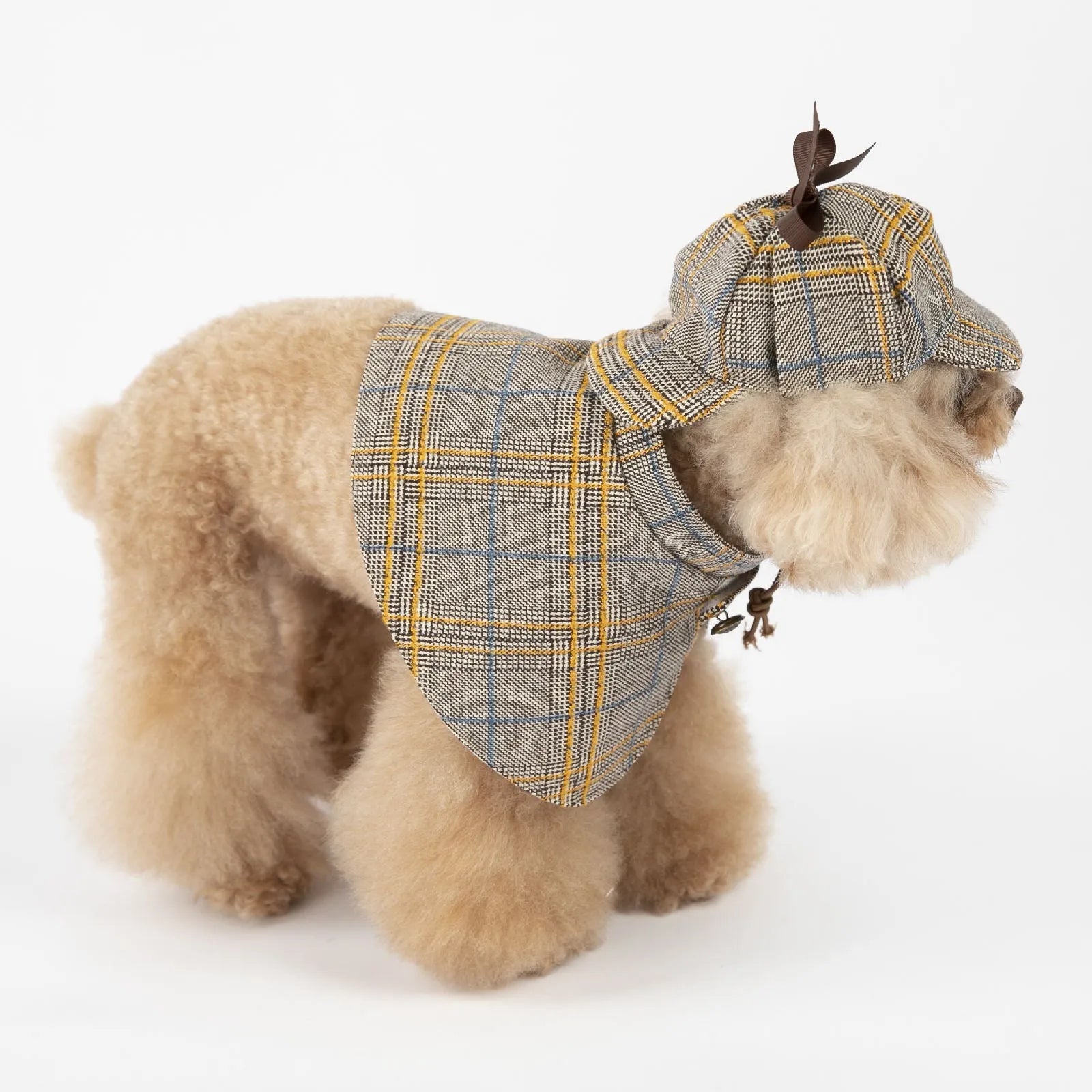 Camel-coloured cotton detective cloak costume for a dog, featuring an adjustable hat.
