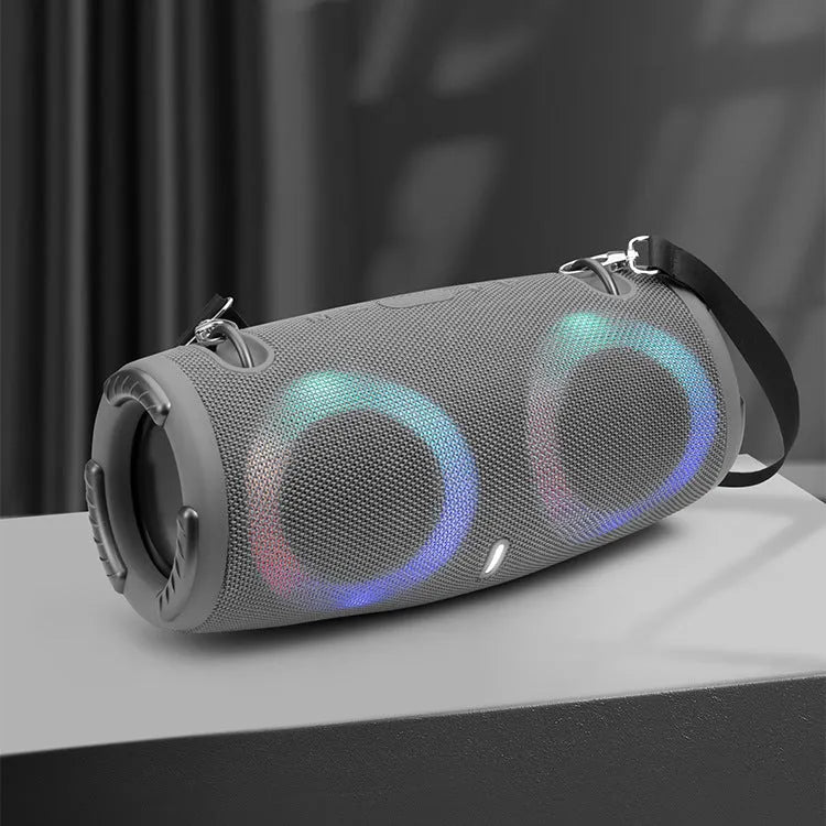 War Drum portable Bluetooth speaker in multiple colours with RGB lights and carrying strap.