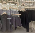 Women's loose-fitting knitted sweater and wide-leg shorts two-piece set in oatmeal colour