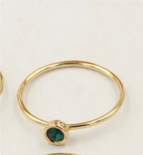 Women's copper knuckle ring with 14K gilded finish and colourful GF zircon stones.