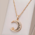 Rose gold star moon pendant necklace with zircon and enamel details on adjustable water wave chain