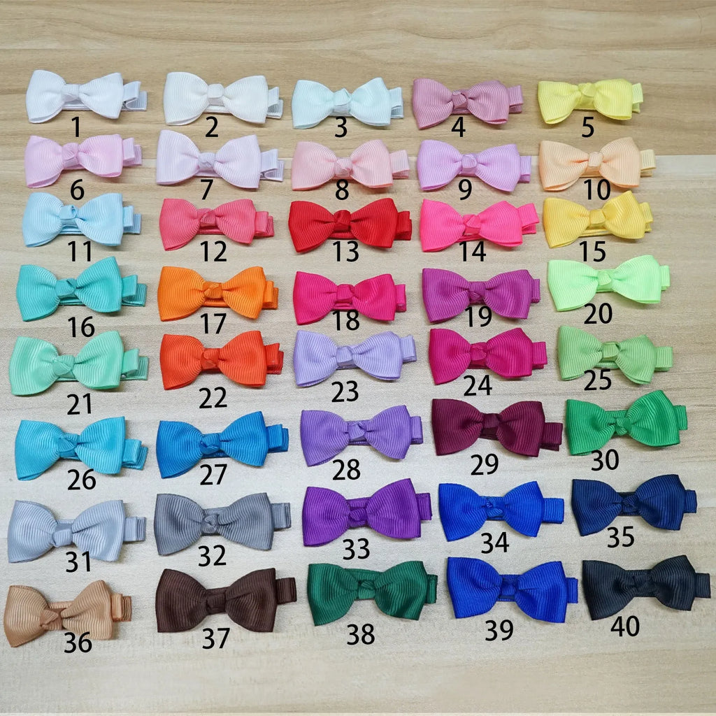 Set of pastel coloured, fully lined no-slip hair clips and bows for baby girls and toddlers.