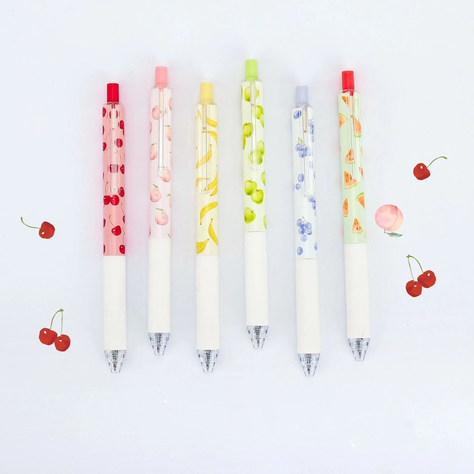 Three fruit scented press-action pens with 0.5mm quick-drying black ink refills