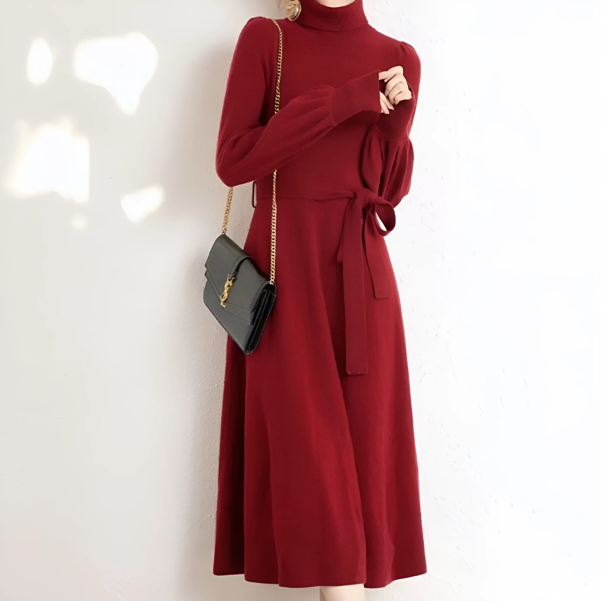 Turtleneck knit dress with elastic waist and loose hem in polyester fabric, shown in solid colour options