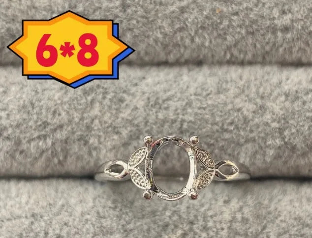 Oval denier ring with open mouth design, five-pointed star ornament, and 6*8mm stone