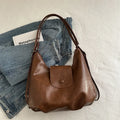 Textured PU leather commuter backpack with horizontal square design and single shoulder strap