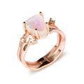 S925 sterling silver ring with triangular geometric design and central moonstone in gold tone plating