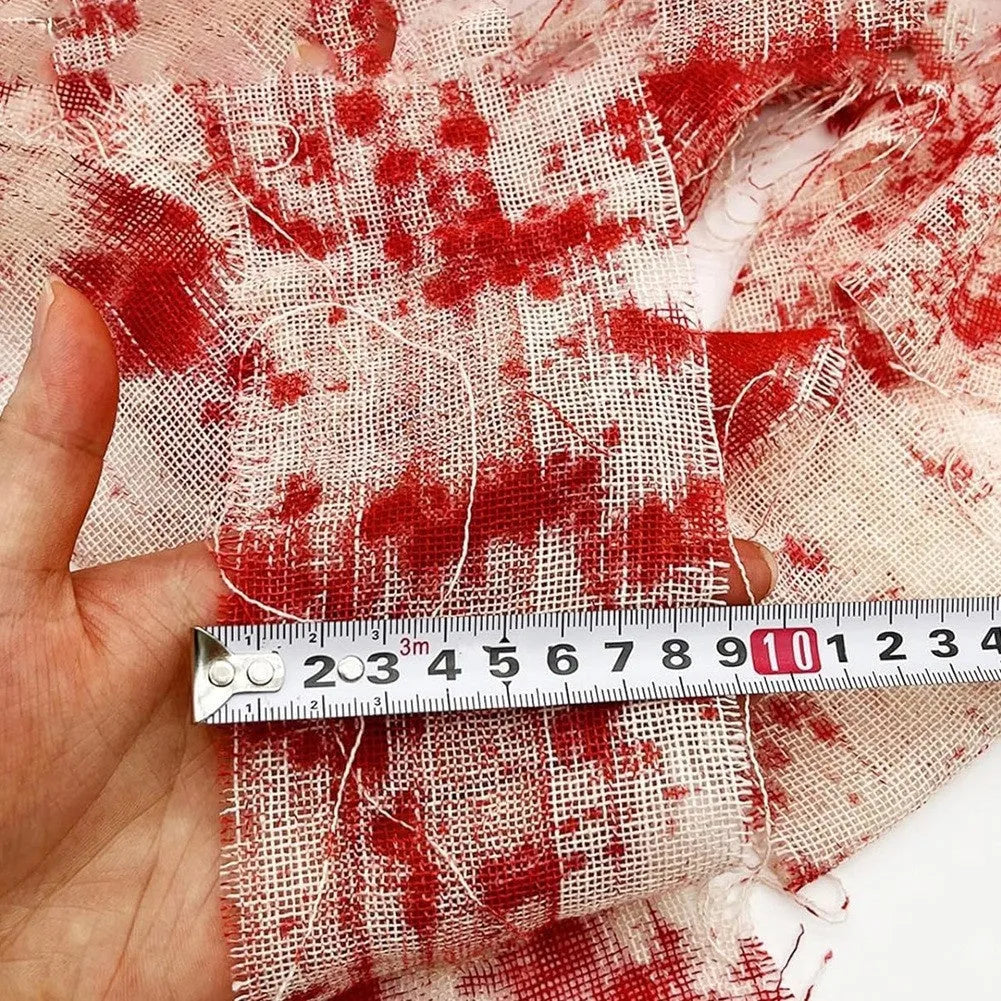 Halloween bloody horror bandage in red colour with 8cm width on a roll for spooky decorations