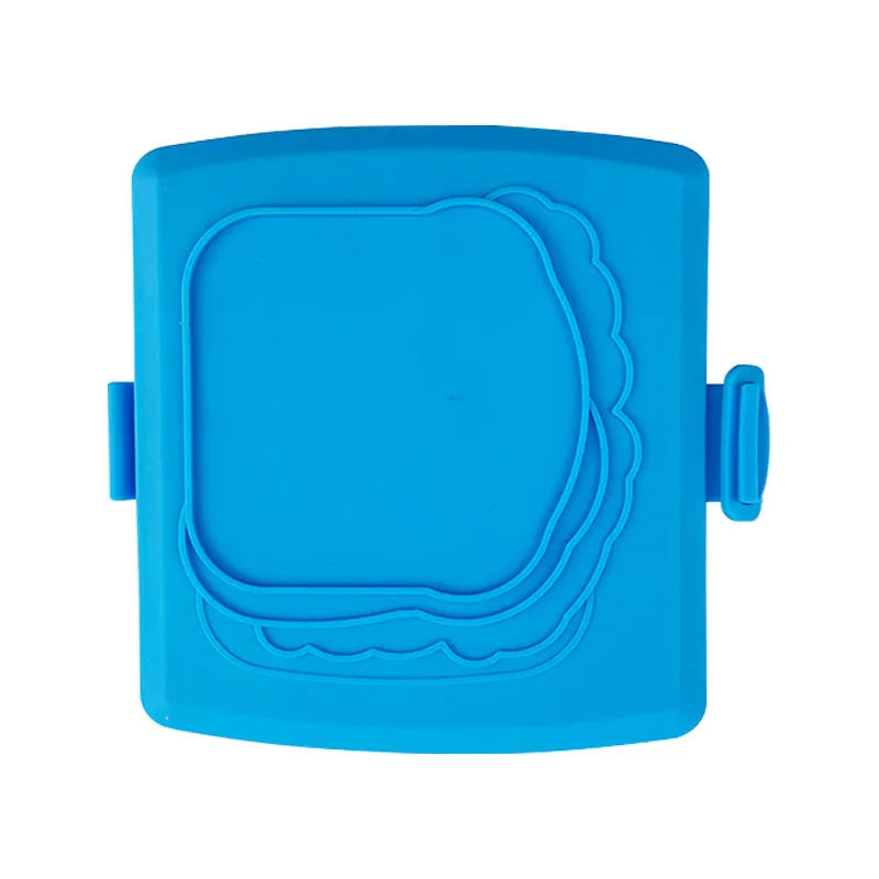 Red silicone baking tray with handbag-style handles and matching oven gloves set