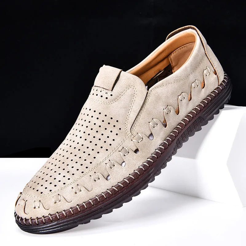 Men's brown casual slip-on leather shoes with round toe and flat sole on a white background.