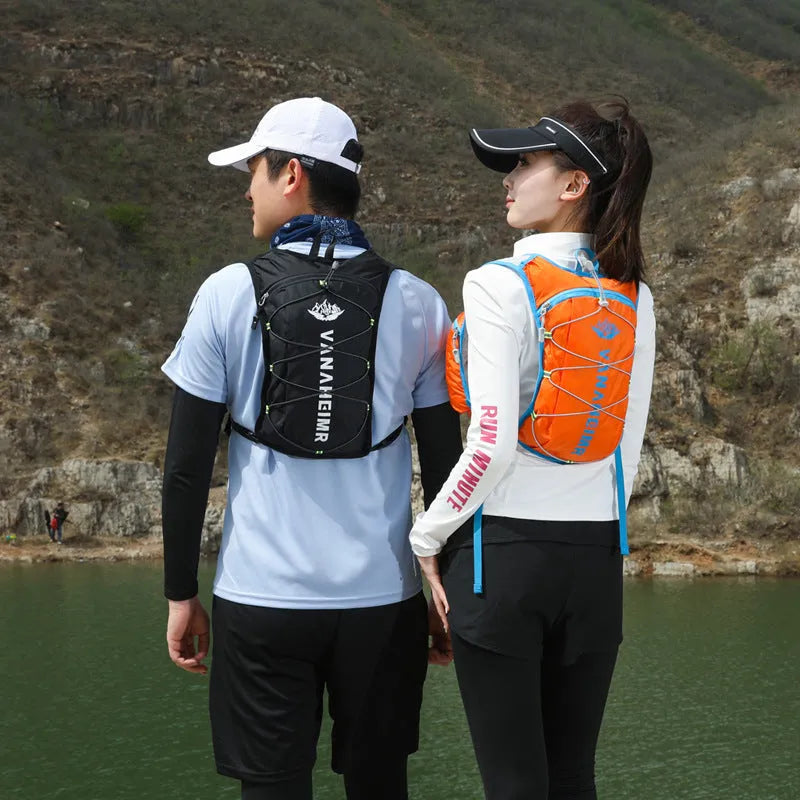 Ultra-light waterproof outdoor sports backpack in streamer orange colour with an air pillow belt.