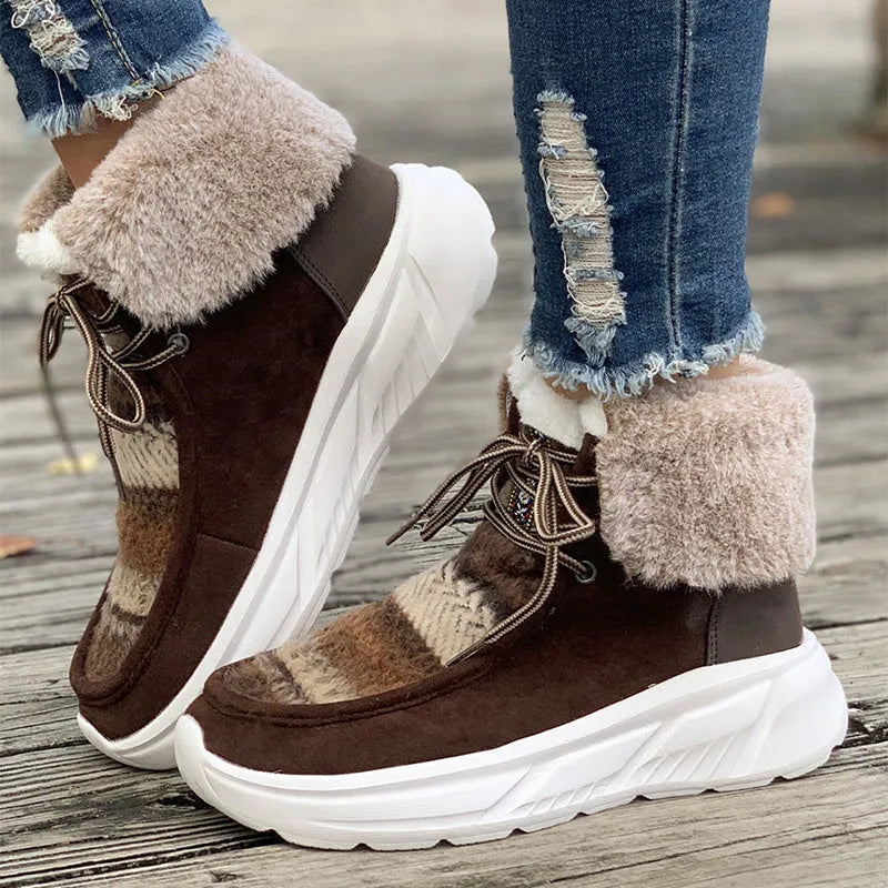 Beige women's lace-up suede snow boots with plush lining and a thick rubber sole.
