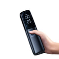 Black portable electric car air pump with pressure gauge and hose