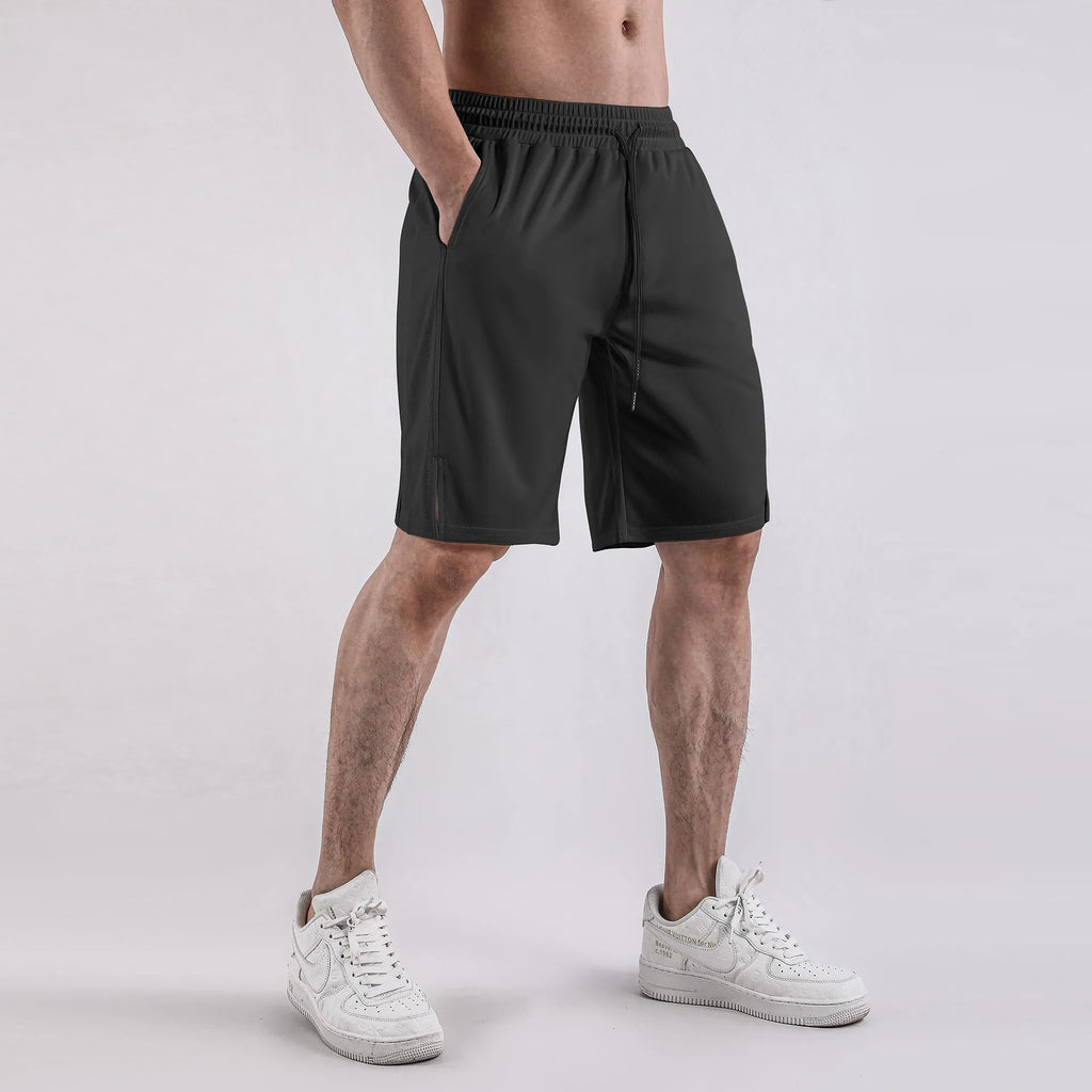 Men's black mesh capri shorts with elastic waistband and loose fit design