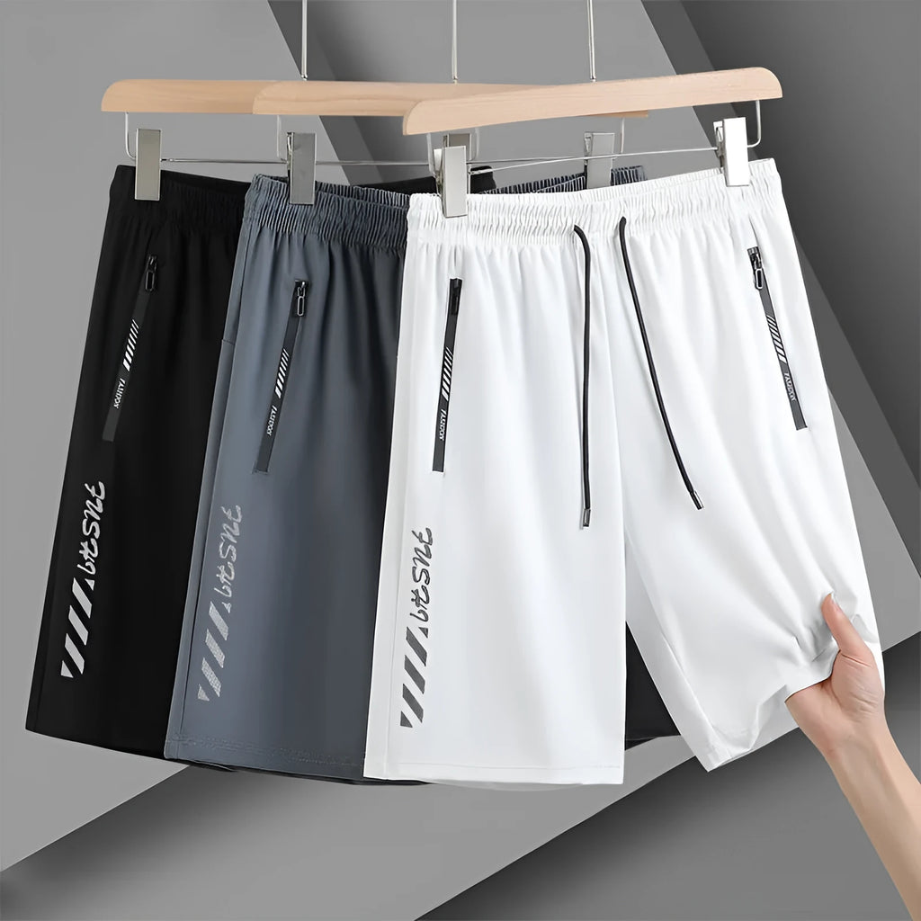 Men's quick-drying nylon sports shorts in loose fit style available in multiple sizes and colours
