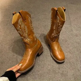 Brown women's embroidered leather Martin boots with a low square heel and mid-calf design.
