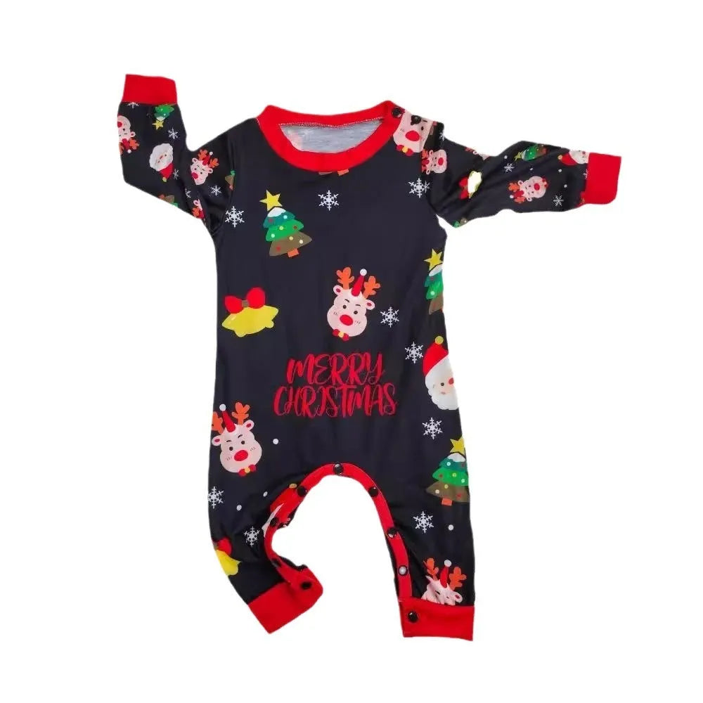 Matching family Christmas pajamas set for parents, children, baby and dog on sofa