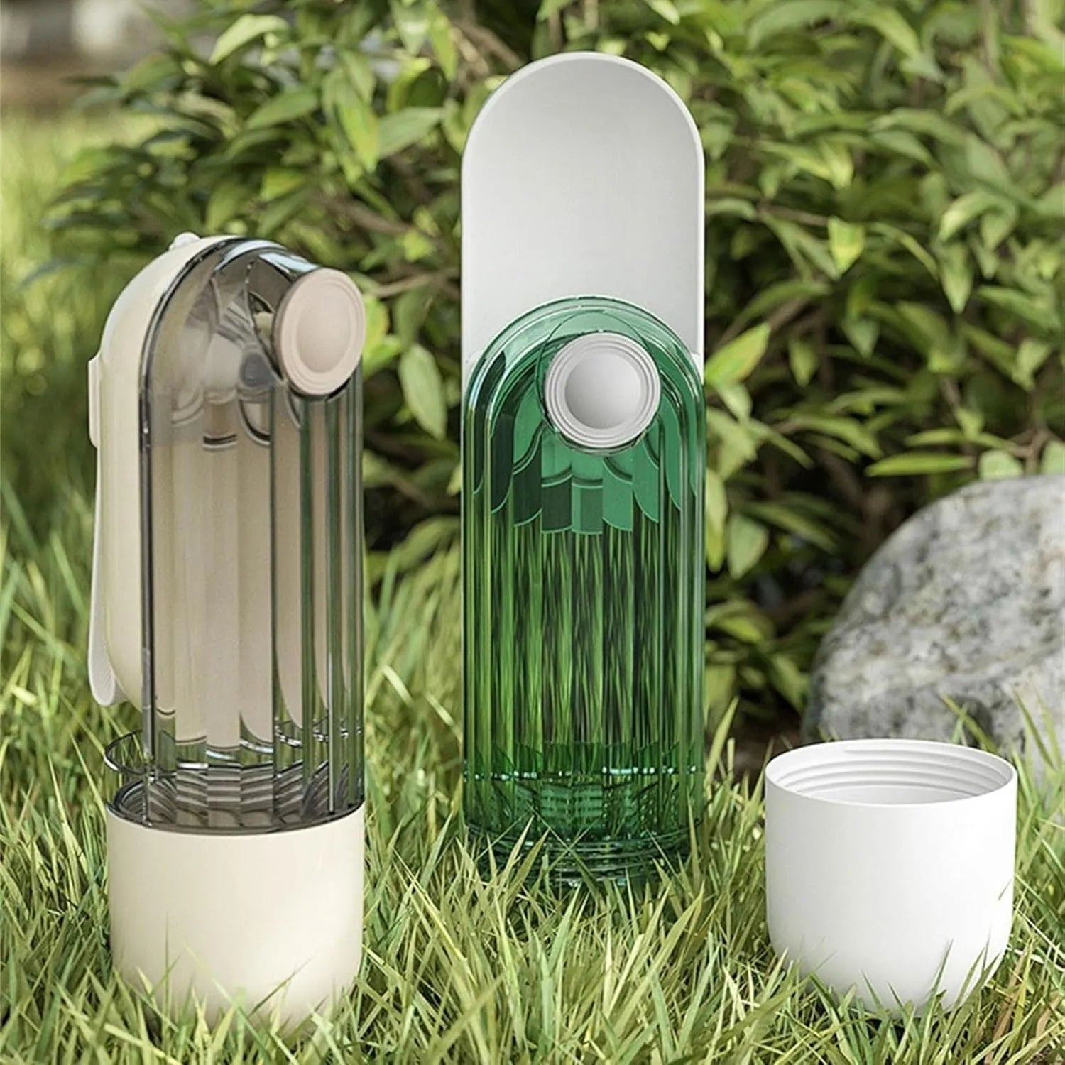 Beige foldable dog water bottle with food container at base, shown extended and collapsed.