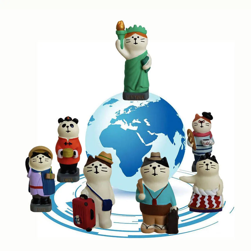 Cartoon cat resin figurine wearing Statue of Liberty crown and holding a globe, Earth Instrument Cat style.