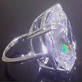 Simple white square diamond ring with geometric design on alloy band in white gold colour