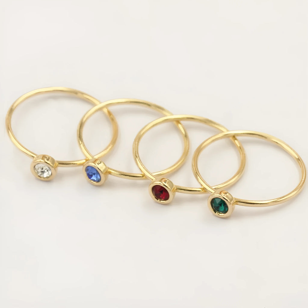 Women's copper knuckle ring with 14K gilded finish and colourful GF zircon stones.