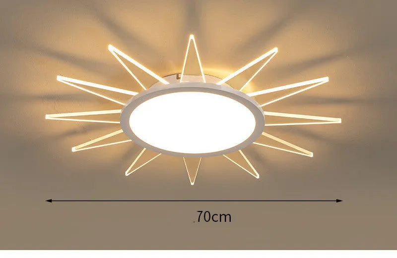 Modern circular aluminium LED ceiling lamp with remote control shown in room setting