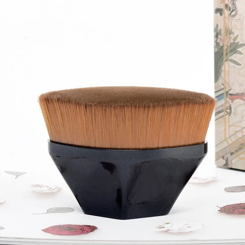 Petal foundation brush with man-made fibre bristles, plastic handle, and storage box in sakura pink or light blue