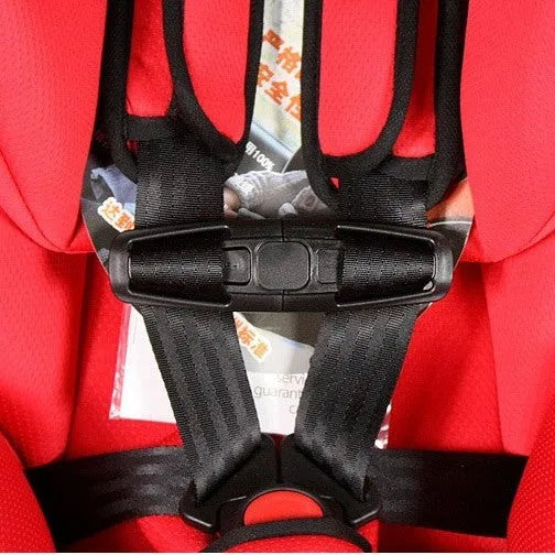 Black nylon child car seat buckle clip for 5-point harness measuring 14.5 by 4 centimetres