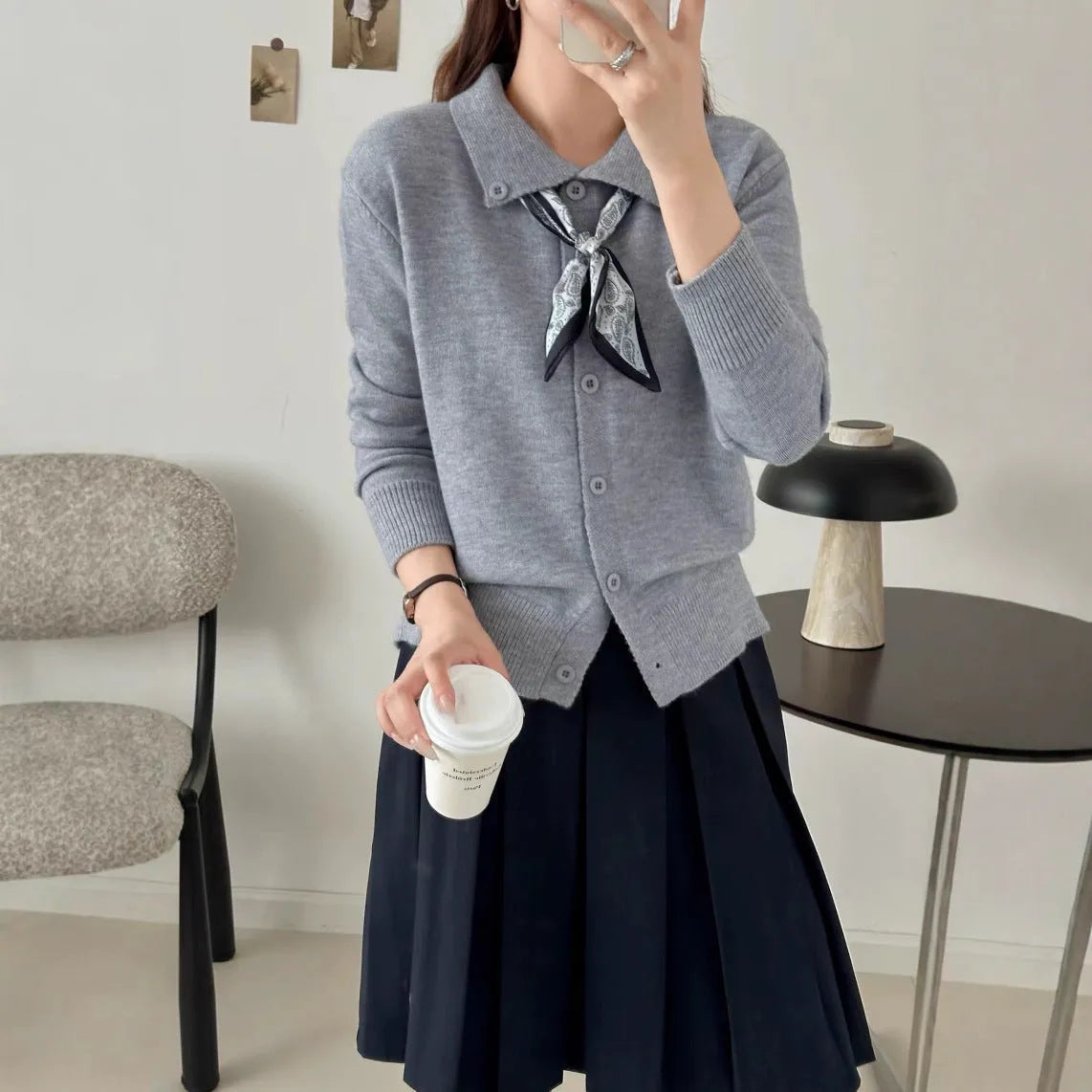 Lazy fashion lapel scarf cardigan sweater in acrylic, shown in a neutral colour.