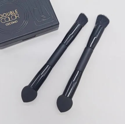 Double-headed makeup brush with miter sponge tip and artificial fibre bristles on wooden handle
