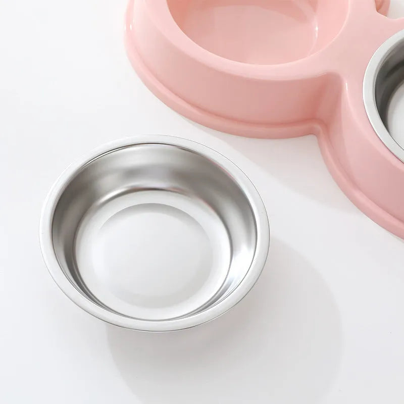 Blue stainless steel one-piece double bowl for pet food and water.