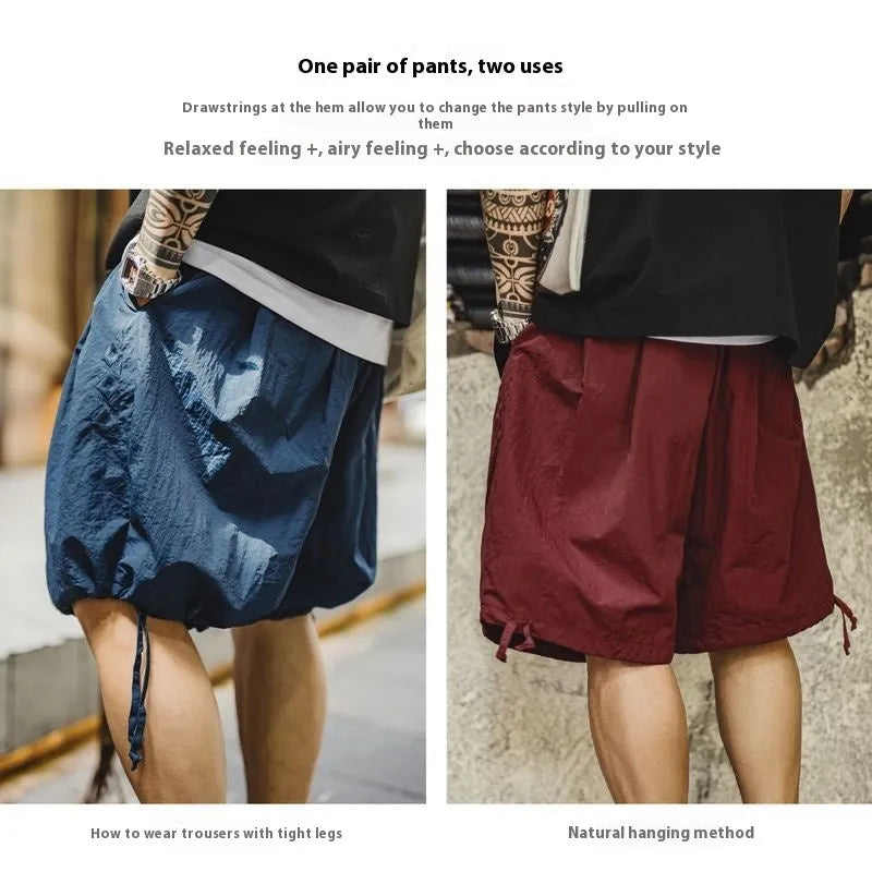 Men's Prussian blue embroidered nylon beach shorts with elastic waistband