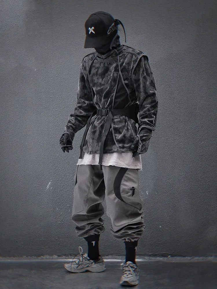 Men's black tie dye printed sweater with a finger turtleneck collar and loose drop-shoulder sleeves.