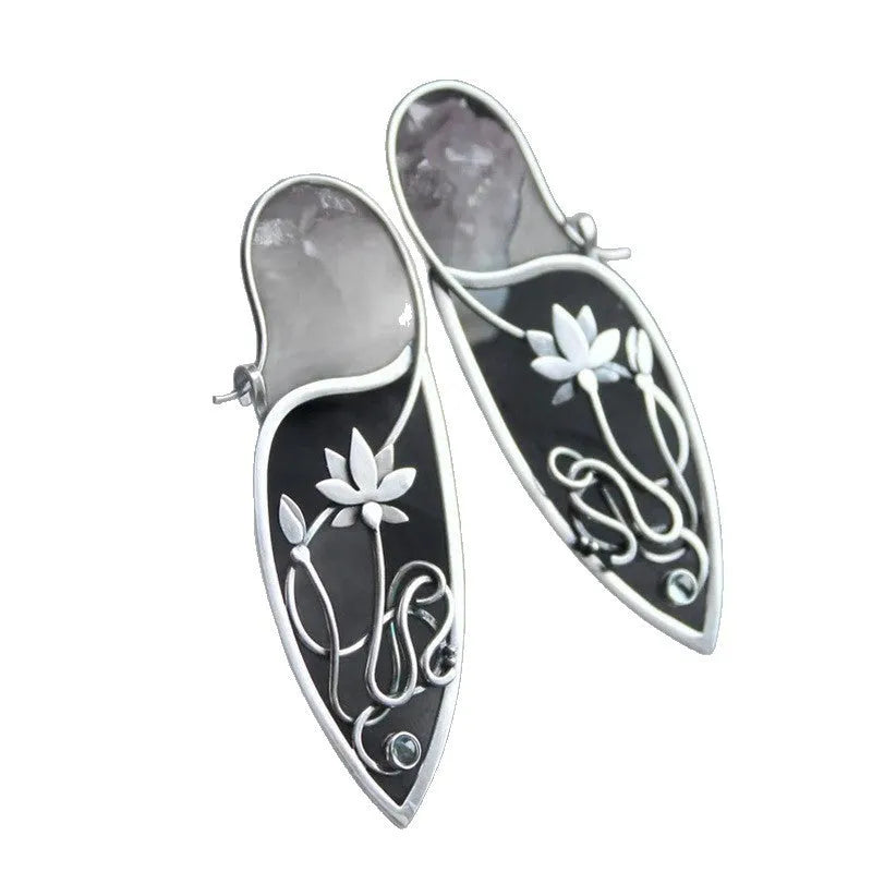 Silver lotus vine rhinestone earrings with geometric floral design
