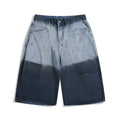 Blue tie-dye gradient cropped jeans with washed-out appearance and loose fit
