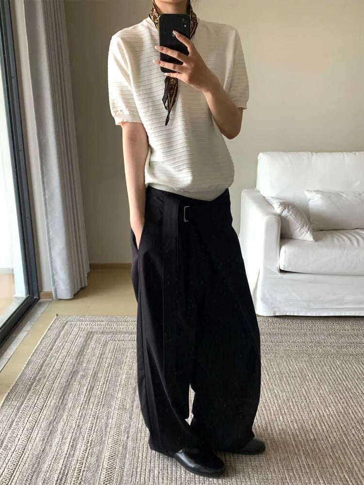 Black straight-leg trousers with single pleat front and adjustable mid waist