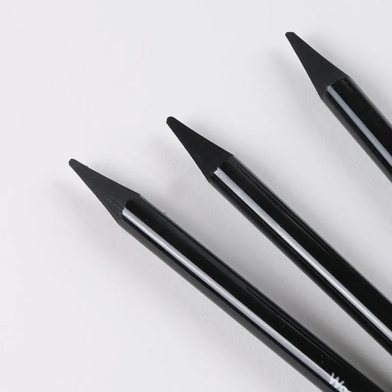 Graphite and carbonised drawing pencil set with wooden shells on suction card packaging