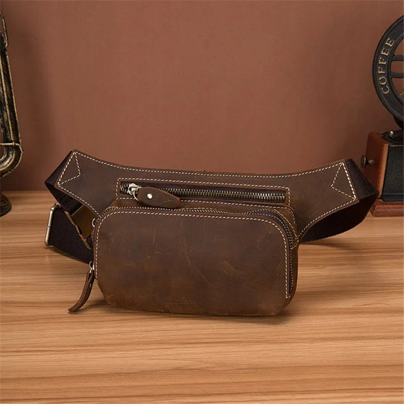 Brown top layer cow leather men's sports waist bag with zip closure.
