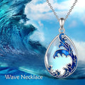 Blue heart-shaped alloy pendant on a necklace chain.