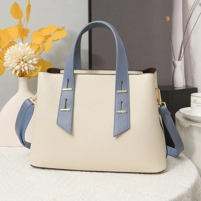 Simple PU shoulder messenger handbag for women in black, khaki, wine red, brown, or beige colour options.