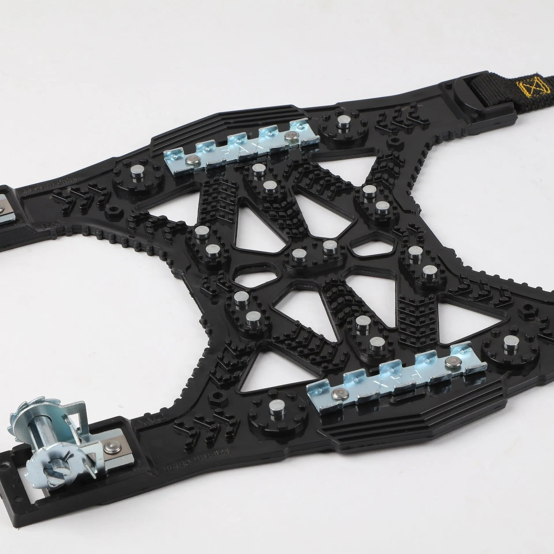 Universal snow chain kit with steel plates, tools, and winter accessories for cars and SUVs