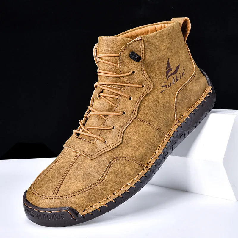 Men's high-top retro ankle boots in beige with elastic band closure and sewing line details