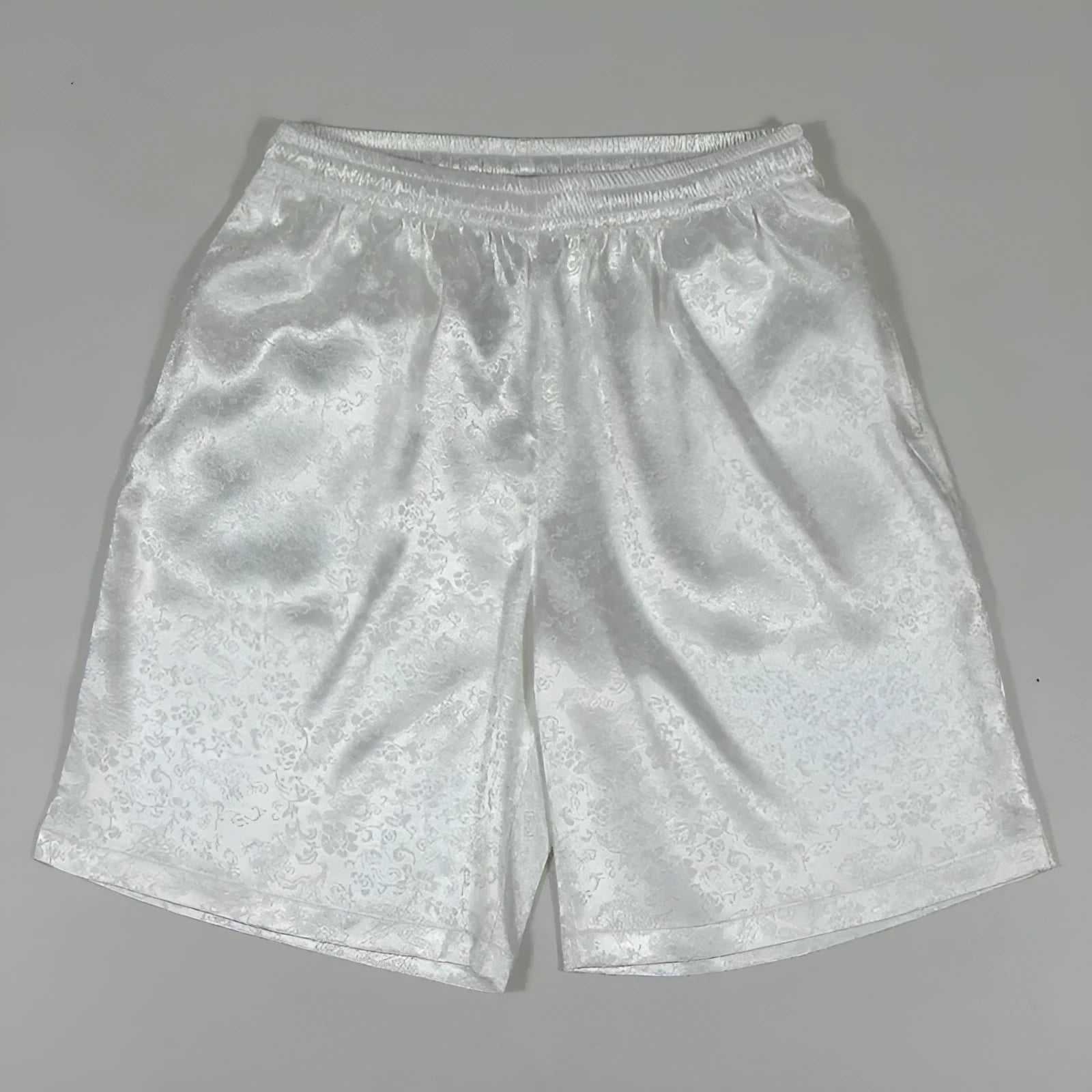 Men's black Tang suit style shorts with an elastic drawstring waistband for Tai Chi.