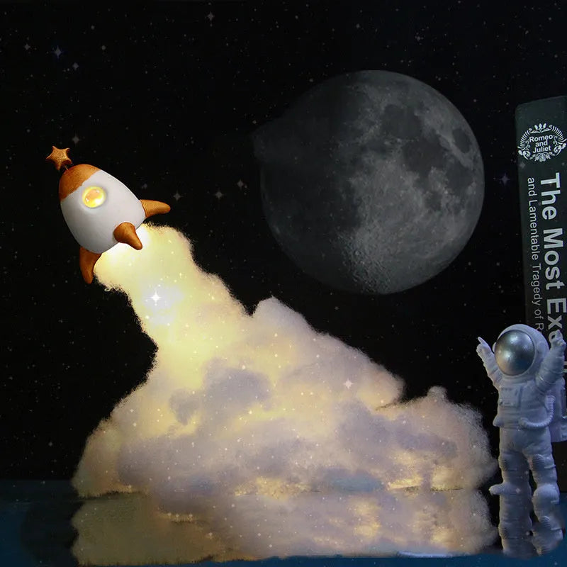 DIY astronaut rocket LED night light kit components including model, string lights, straws, and chassis.