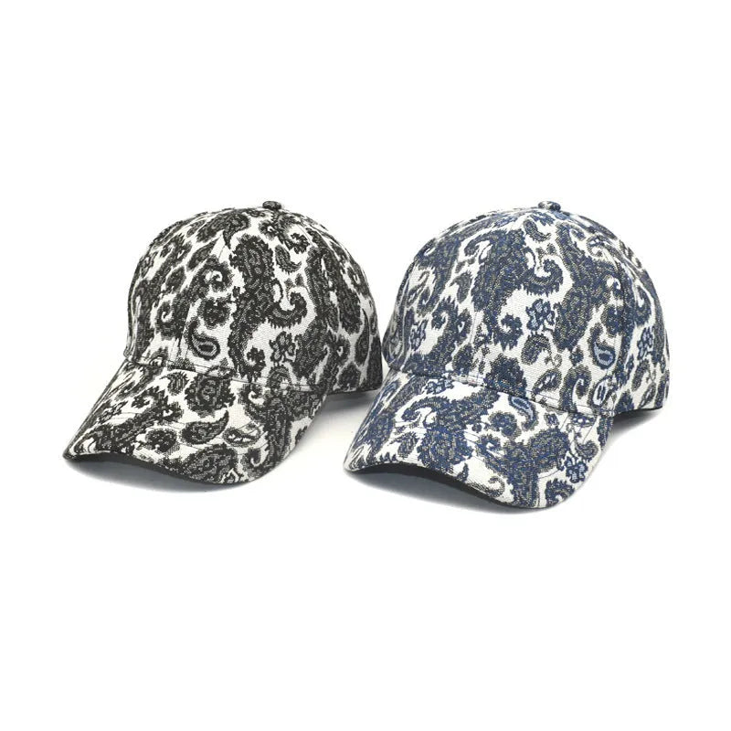 Polyester baseball cap with paisley pattern print in blue, black or wine red colours showing dome crown design